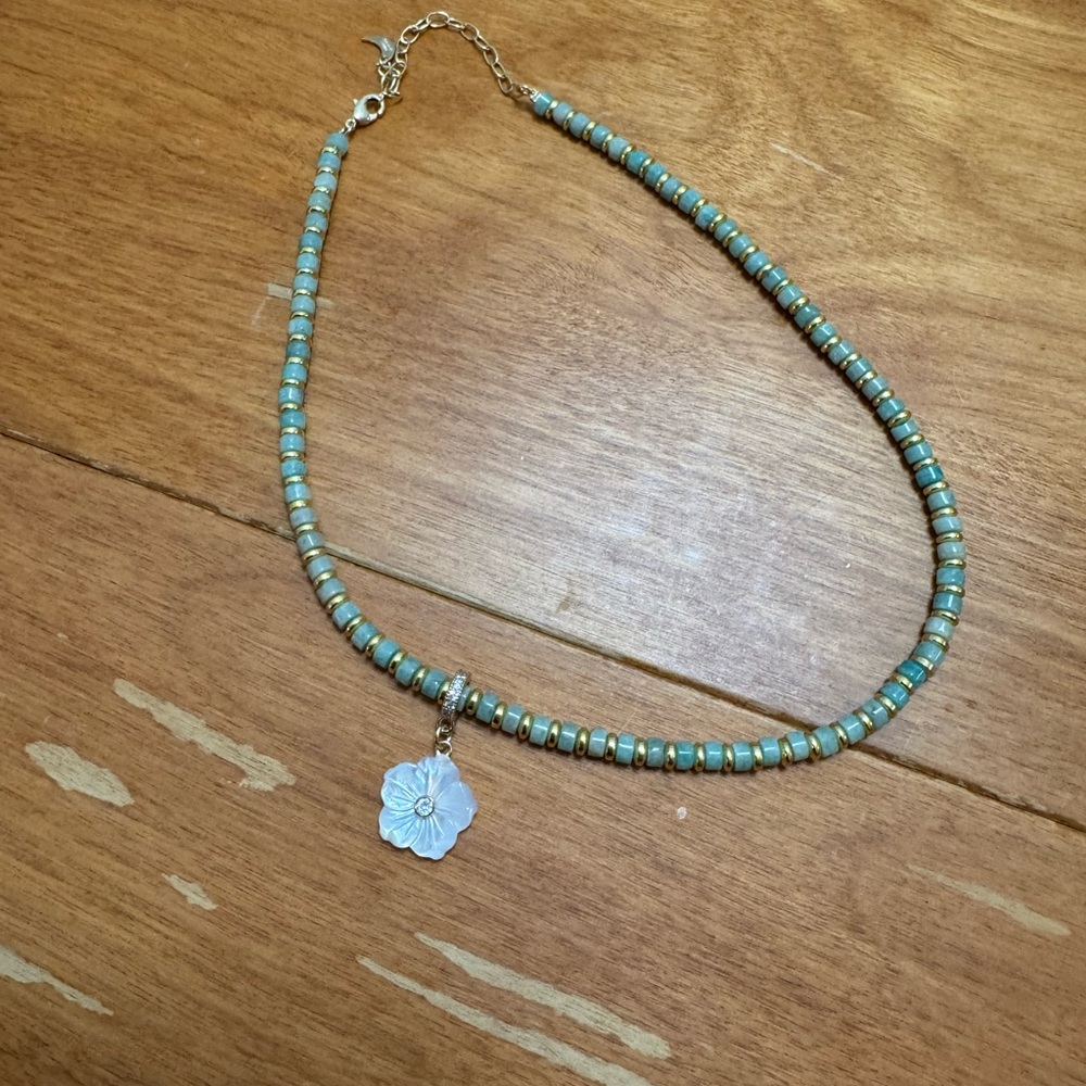Chic Turquoise Beaded Necklace with Silver Floral Charm